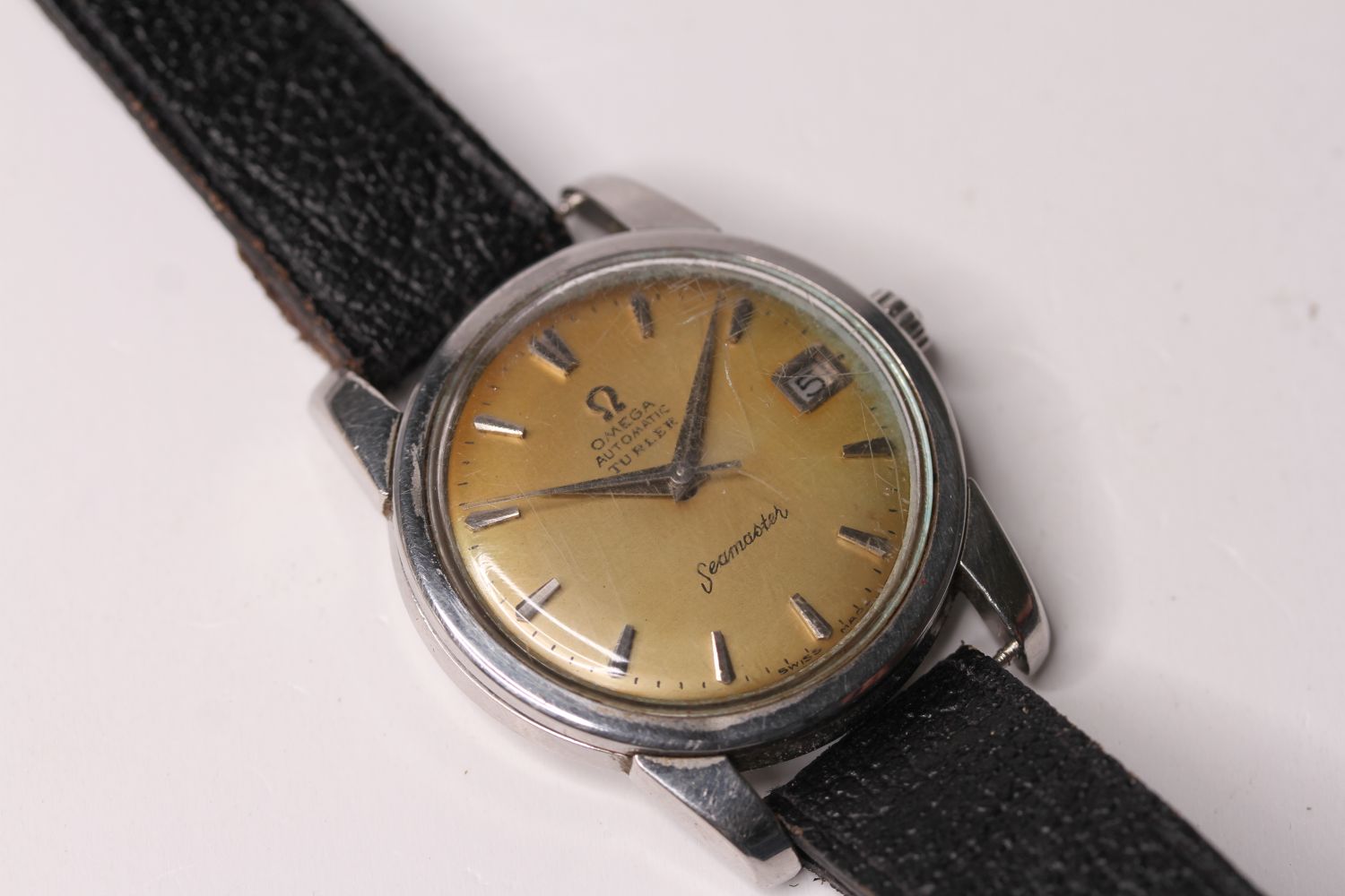 VINTAGE OMEGA SEAMASTER AUTOMATIC WITH TURLER RETAIL SIGNATURE, circular cream dial with applied