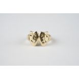 9CT GOLD MASK FACE SIGNET RING, gross weight is 5.10g.