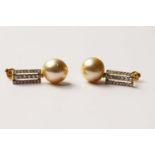 Pair Of Pearl & Diamond Earrings, set with 2 cultured south sea pearls, 44 round brilliant cut
