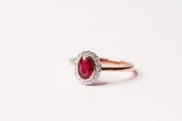 Ruby & Diamond Ring, set with 1 oval cut natural ruby 0.97ct, surrounded by 18 round brilliant cut