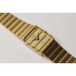 GENTLEMAN'S VINTAGE ROTARY WRIST WATCH WITH BOX, rectangular champagne dial and hands, 25mm gold