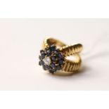 Vintage Sapphire and Diamond Cluster Ring, central tired cluster of sapphires with a brilliant cut