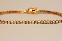 18ct rose gold diamond line bracelet, boxed. Round brilliant cut diamonds 4.16ct approximately, 18cm