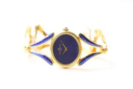 LADIES BAUME & MERCIER ENAMEL WRISTWATCH, oval lapis lazuli dial, stone set crown, 25mm 18ct