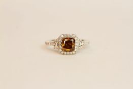 18ct white gold fancy brown cushion-cut diamond ring with diamond halo and shoulders. Fancy