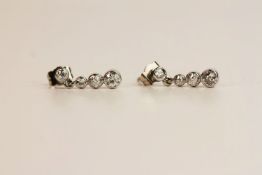 Pair of Diamond Drop Earrings, bezel set diamonds