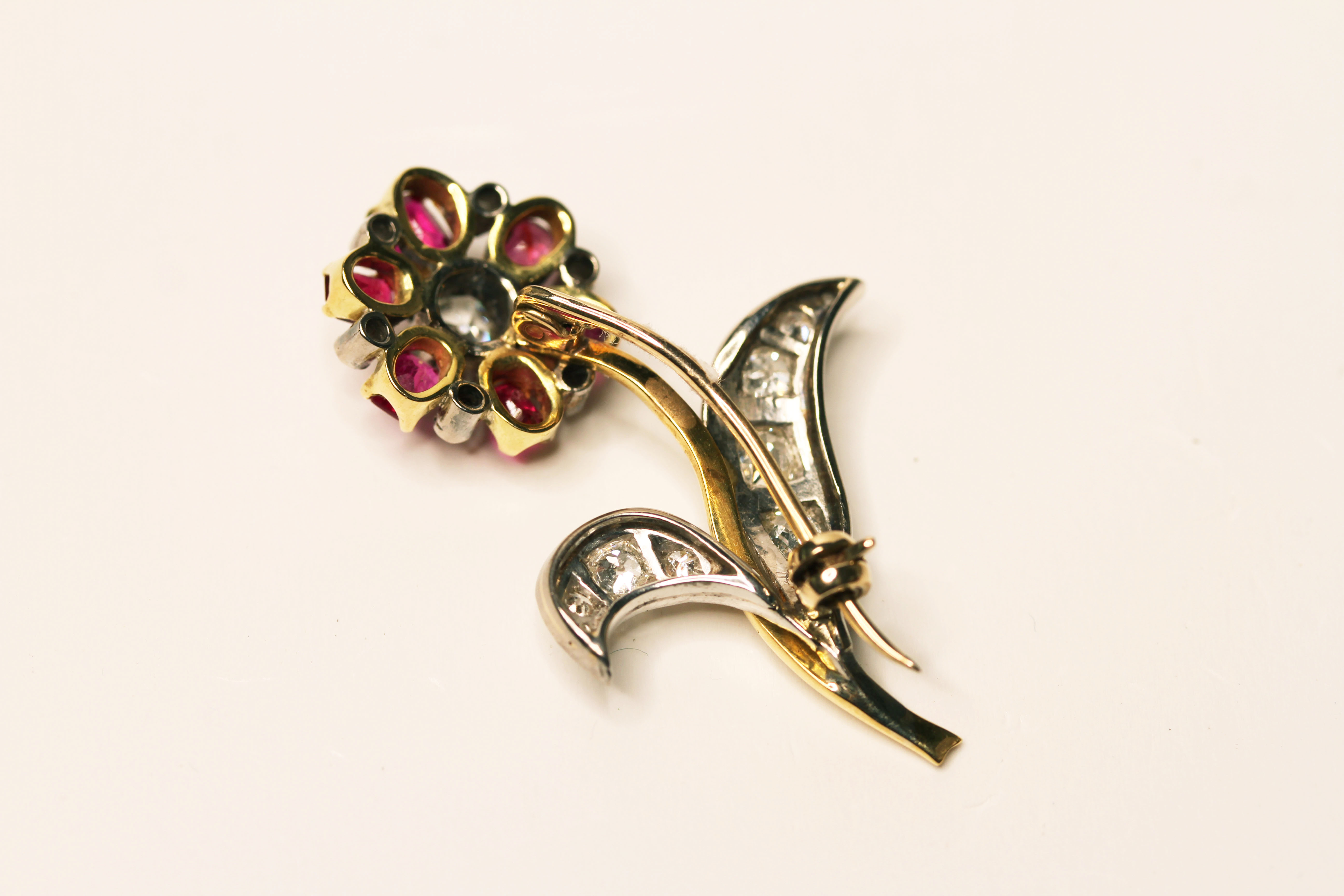 EDWARDIAN RUBY AND DIAMOND TWO TONE FLOWER BROOCH, 18ct gold, approximate size 43mm x 28mm. - Image 2 of 3