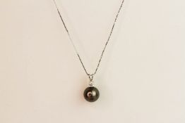 9ct white gold Tahitian black pearl pendant with diamond bale on a 10ct white gold chain, boxed.