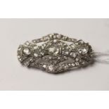 Victorian Rose Cut Diamond Plaque Brooch, three feature rose cut diamonds measuring approximately