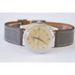 GENTLEMENS OMEGA DRESS WRISTWATCH, circular cream patina dial with ice cream cone hour markers and