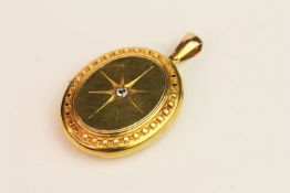 15ct Gold Oval Locket, centre diamond to front, on