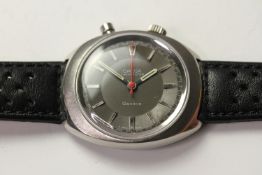 VINTAGE OMEGA CHRONOSTOP DRIVERS WATCH REFERENCE 145.010, circular grey dial, baton hour markers,