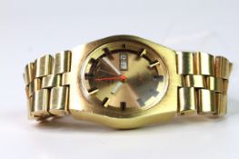 VINTAGE TISSOT AUTOMATIC PR516 GL WRIST WATCH, circular champagne dial with baton hour markers,