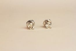 Pair 18ct white gold four claw diamond solitaire studs. 1.02ct total. Boxed, butterfly backs.