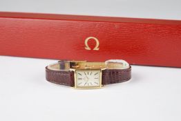 LADIES OMEGA GOLD PLATED WRISTWATCH W/ BOX REF. ST 511.163, rectangular silver dial with stick