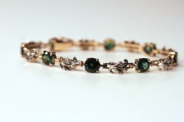 GREEN STONE AND DIAMOND FANCY BRACELET, approximate total weight 9.6gms, approximate length 17cm.