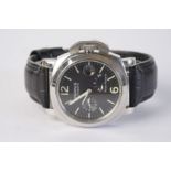 GENTLEMENS PARNIS AUTOMATIC POWER RESERVE WRISTWATCH, circular black dial with luminous hour markers