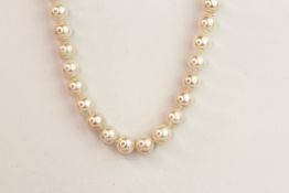 String of white cultured pearls with a 9ct yellow gold ball clasp