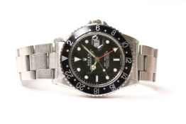 VINTAGE ROLEX GMT MASTER REFERENCE 16750 WITH BOX AND ROLEX SERVICE CARD, circular black dial with