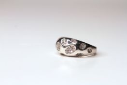 Farone designer diamond ring, mounted in white metal stamped 'Pt 950', set with concave sections