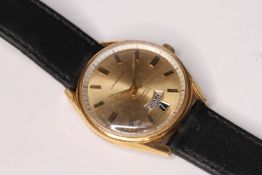 1960s CARAVELLE AUTOMATIC WRIST WATCH, circular champagne dial with baton hour markers, day and date
