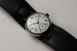 SILVER CASED TRENCH WATCH, white dial with red twelve hour markers, Arabic numerals, manual wind,