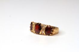 Garnet & diamond ring, centre garnet measuring approximately 8mm x 6mm, garnet measuring