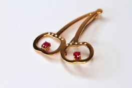 18CT DOUBLE APPLE BROOCH SET WITH 10 X 0.01CT DIAMONDS AND 2 X RUBIES, hallmarked 18ct yellow