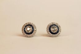 Pair of 18ct white gold old-cut diamond and sapphire target-style studs, boxed. Total carat weights: