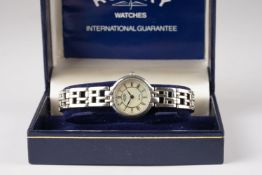 LADIES ROTARY ELITE STERLING SILVER WRISTWATCH W/ BOX & GUARANTEE, circular mother of pearl dial
