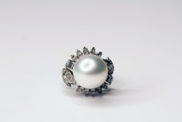 Large pearl and diamond fancy cocktail ring, mounted in white metal stamped 14k, large white pearl