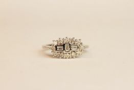 18ct white gold diamond fancy cluster ring. Baguette and round brilliant cut diamonds 0.50 ct,