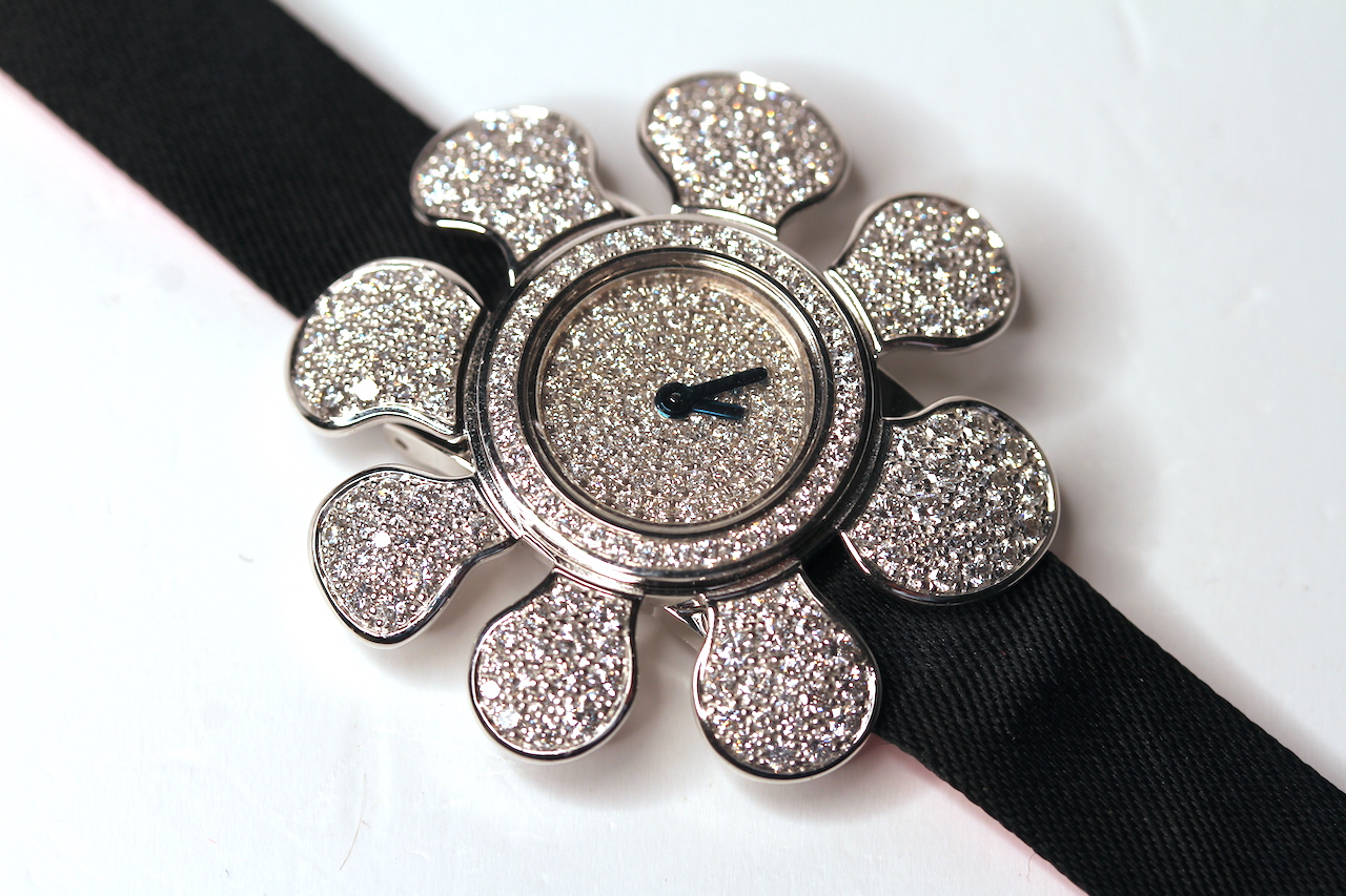 LADIES 18K DAMOISELLE D FULLY LOADED DIAMOND WATCH, round pave set diamond dial with black hands,