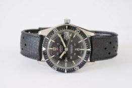 GENTLEMENS CORVETTE DIVERS WRISTWATCH, circular black dial with hour markers and paddle hands,