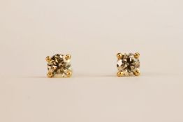 Pair 18ct yellow gold four claw round brilliant cut diamond solitaire studs. 0.62ct total. Boxed,