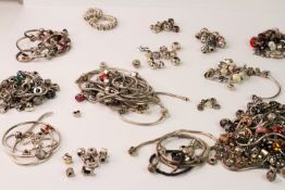 BAG OF SILVER CHARMS 1300g, a bag of a variety of silver charms, 1300g in weight, including Thomas