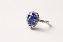 Tanzanite and Diamond Ring, set with 1 pear cut natural tanzanite 2.29ct, surrounded by 30 round