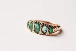Emerald & Diamond Ring, set with 5 oval cut natural emeralds totalling 2.01ct, 8 round brilliant cut
