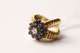 Vintage Sapphire and Diamond Cluster Ring, central tired cluster of sapphires with a brilliant cut
