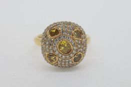 Unusual ‘Bombe’ Style Ring, with bezel set yellow diamonds totalling approximately 1.01ct, white