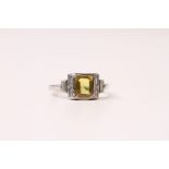 Yellow Sapphire & Diamond Ring, bezel set step cut yellow sapphire with step shoulders of baguette