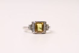 Yellow Sapphire & Diamond Ring, bezel set step cut yellow sapphire with step shoulders of baguette