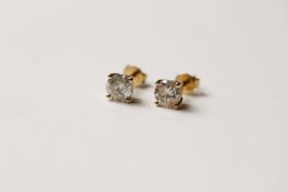 Pair of Diamond Stud Earrings, set with 2 round brilliant cut diamonds totalling 1.41ct, 4 claw set,