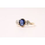 Sapphire & Diamond 3 Stone Ring, central oval sapphire bezel set in yellow gold, two outer