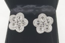 Pair Of Large Flower Earrings, with rose diamond centres, total approximate diamond weight 2.00ct,