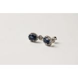 Pair of Sapphire & Diamond Earrings, set with 2 oval cut natural sapphires totalling 2.13ct,