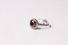 Diamond Cluster Ring, set with a fancy orange brown diamond 1.64ct, surrounded by 30 round brilliant