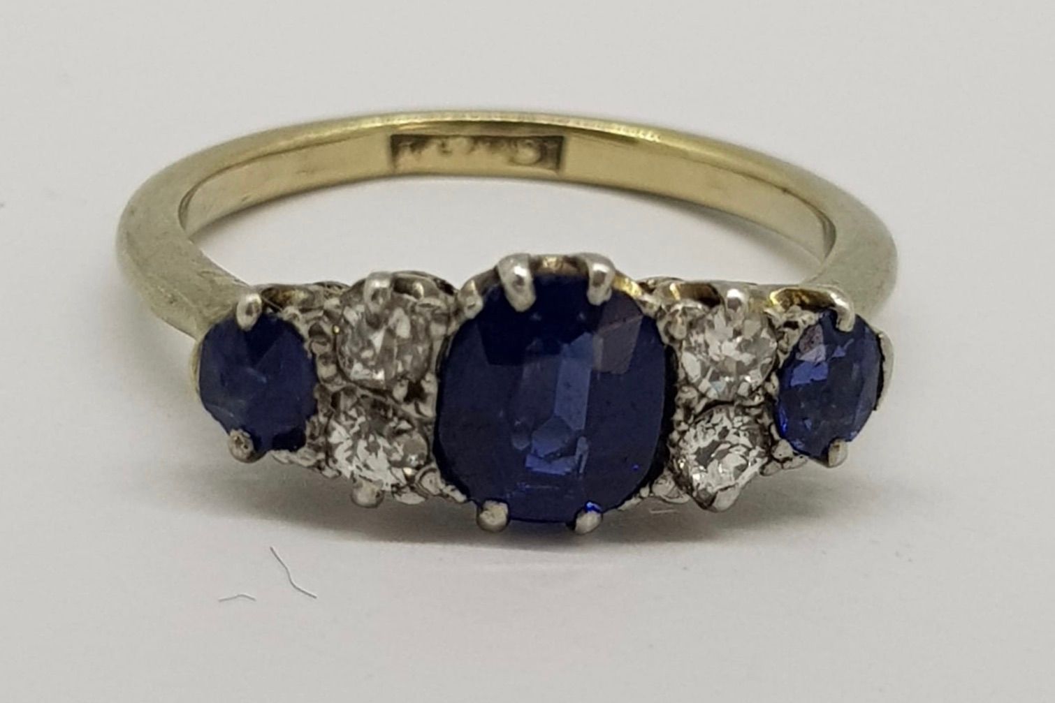 Edwardian Sapphire & Diamond Ring, 3 sapphires with 4 old cut diamonds between, stamped 18ct gold