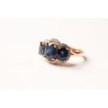 Sapphire & Diamond Trilogy Ring, set with 3 oval cut natural sapphires totalling 3.76ct,