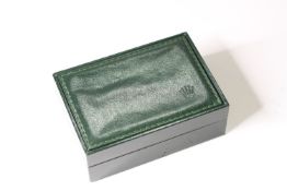 Rolex watch box, green leather with stitched detail, wood interior with soft cushion and cover